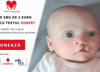 Ajută-l pe Robert să zâmbească! S-a născut cu o anomalie gravă a gurii şi nu poate mânca normal